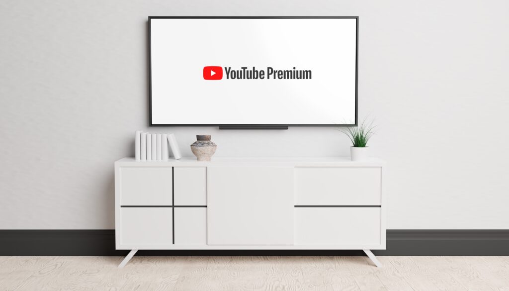 テレビ台の上にYou Tube Premiumと書かれたモニターが置かれている